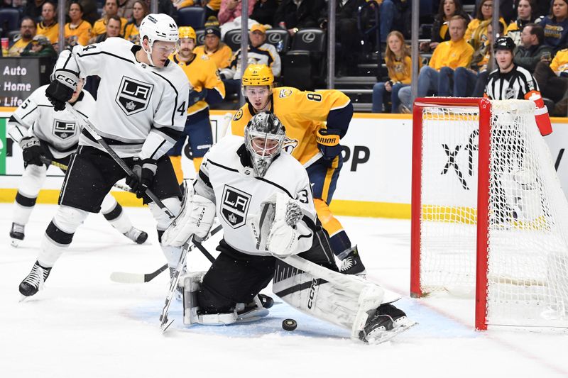 Jan 31, 2024; Nashville, Tennessee, USA; Los Angeles Kings goaltender David Rittich (31) makes a save during the third period against the Nashville Predators at Bridgestone Arena. Mandatory Credit: Christopher Hanewinckel-USA TODAY Sports