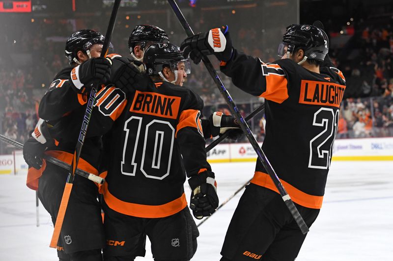 Oct 31, 2024; Philadelphia, Pennsylvania, USA; Philadelphia Flyers right wing Bobby Brink (10) celebrates his goal with teammates against the St. Louis Blues during the third period at Wells Fargo Center. Mandatory Credit: Eric Hartline-Imagn Images