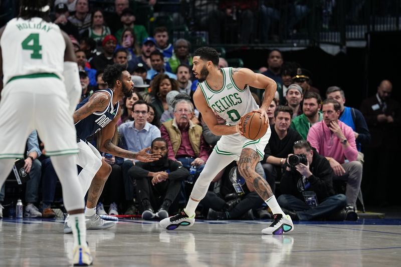 DALLAS, TX - JANUARY 22: Jayson Tatum #0 of the Boston Celtics handles the ball during the game against the Dallas Mavericks on January 22, 2024 at the American Airlines Center in Dallas, Texas. NOTE TO USER: User expressly acknowledges and agrees that, by downloading and or using this photograph, User is consenting to the terms and conditions of the Getty Images License Agreement. Mandatory Copyright Notice: Copyright 2024 NBAE (Photo by Glenn James/NBAE via Getty Images)