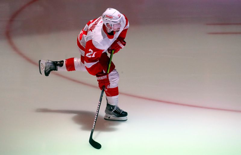 Apr 11, 2024; Pittsburgh, Pennsylvania, USA; Detroit Red Wings center Austin Czarnik (21) takes the ice to warm up against the Pittsburgh Penguins at PPG Paints Arena. Mandatory Credit: Charles LeClaire-USA TODAY Sports