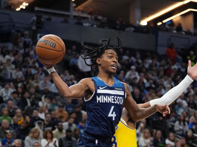 MINNEAPOLIS, MN -  DECEMBER 13: Rob Dillingham #4 of the Minnesota Timberwolves passes the ball during the game against the Los Angeles Lakers on December 13, 2024 at Target Center in Minneapolis, Minnesota. NOTE TO USER: User expressly acknowledges and agrees that, by downloading and or using this Photograph, user is consenting to the terms and conditions of the Getty Images License Agreement. Mandatory Copyright Notice: Copyright 2024 NBAE (Photo by Jordan Johnson/NBAE via Getty Images)