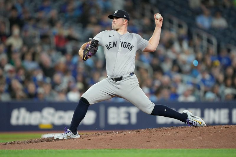 Apr 16, 2024; Toronto, Ontario, CAN; New York Yankees starting pitcher Carlos Rodon (55) pitches to the Toronto Blue Jays during the fourth inning at Rogers Centre. Mandatory Credit: John E. Sokolowski-USA TODAY Sports