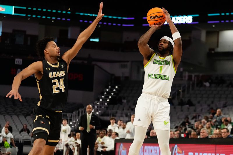 Mar 16, 2024; Fort Worth, TX, USA;  South Florida Bulls guard Selton Miguel (1) attempts a three point basket against UAB Blazers guard Efrem Johnson (24) during the first half at Dickies Arena. Mandatory Credit: Chris Jones-USA TODAY Sports