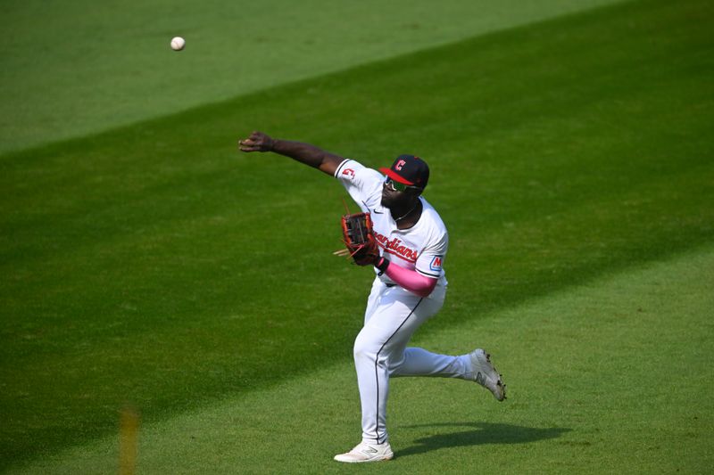 Oct 12, 2024; Cleveland, Ohio, USA; Cleveland Guardians outfielder Jhonkensy Noel (43) throws the infield in the second inning against the Detroit Tigers during game five of the ALDS for the 2024 MLB Playoffs at Progressive Field. Mandatory Credit: David Richard-Imagn Images