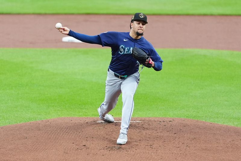 May 18, 2024; Baltimore, Maryland, USA; Baltimore Orioles pitcher Grayson Rodriguez (30) delivers a pitch against the Seattle Mariners during the first inning at Oriole Park at Camden Yards. Mandatory Credit: Gregory Fisher-USA TODAY Sports