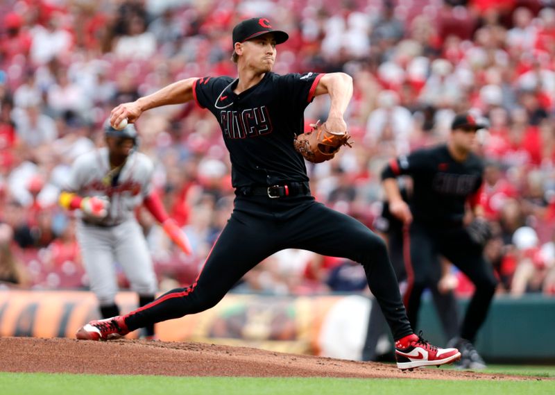 Jun 23, 2023; Cincinnati, Ohio, USA; Cincinnati Reds starting pitcher Luke Weaver (34) delivers a pitch against the Atlanta Braves during the first inning at Great American Ball Park. Mandatory Credit: David Kohl-USA TODAY Sports