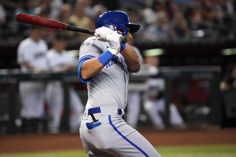 Apr 25, 2023; Phoenix, Arizona, USA; Kansas City Royals third baseman Nicky Lopez (8) hits an RBI single against the Arizona Diamondbacks during the fourth inning at Chase Field. Mandatory Credit: Joe Camporeale-USA TODAY Sports