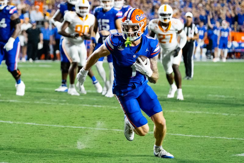 Sep 16, 2023; Gainesville, Florida, USA; Florida Gators wide receiver Ricky Pearsall (1) runs with the ball during the first half between the Florida Gators and Tennessee Volunteers at Ben Hill Griffin Stadium. Mandatory Credit: Chris Watkins-USA TODAY Sports