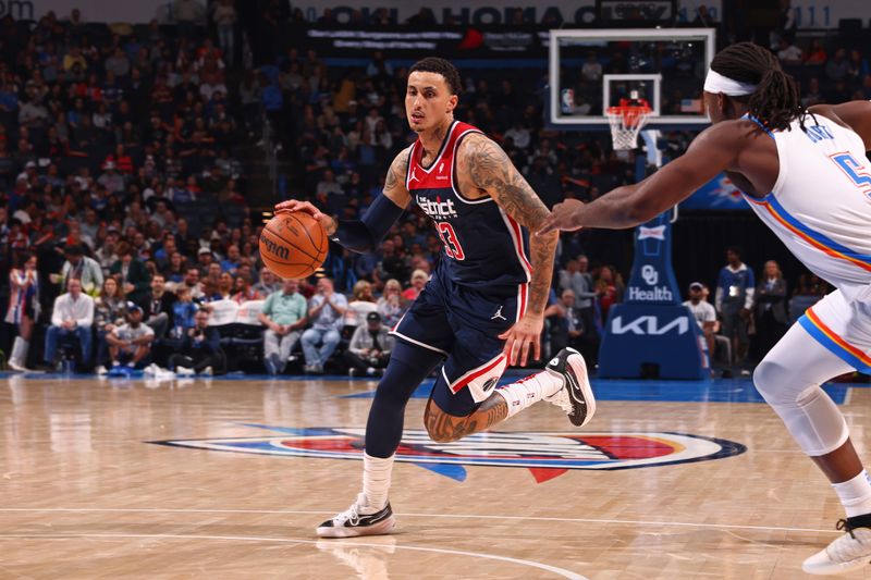 OKLAHOMA CITY, OK - FEBRUARY 23: Kyle Kuzma #33 of the Washington Wizards handles the ball during the game against the Oklahoma City Thunder on February 23, 2024 at Paycom Arena in Oklahoma City, Oklahoma. NOTE TO USER: User expressly acknowledges and agrees that, by downloading and or using this photograph, User is consenting to the terms and conditions of the Getty Images License Agreement. Mandatory Copyright Notice: Copyright 2024 NBAE (Photo by Zach Beeker/NBAE via Getty Images)