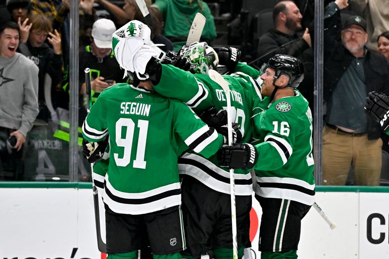 Nov 14, 2023; Dallas, Texas, USA; Dallas Stars center Matt Duchene (95) and center Tyler Seguin (91) and defenseman Miro Heiskanen (4) and goaltender Jake Oettinger (29) and center Joe Pavelski (16) celebrates after Duchene scores the game winning goal against the Arizona Coyotes during the overtime period at the American Airlines Center. Mandatory Credit: Jerome Miron-USA TODAY Sports