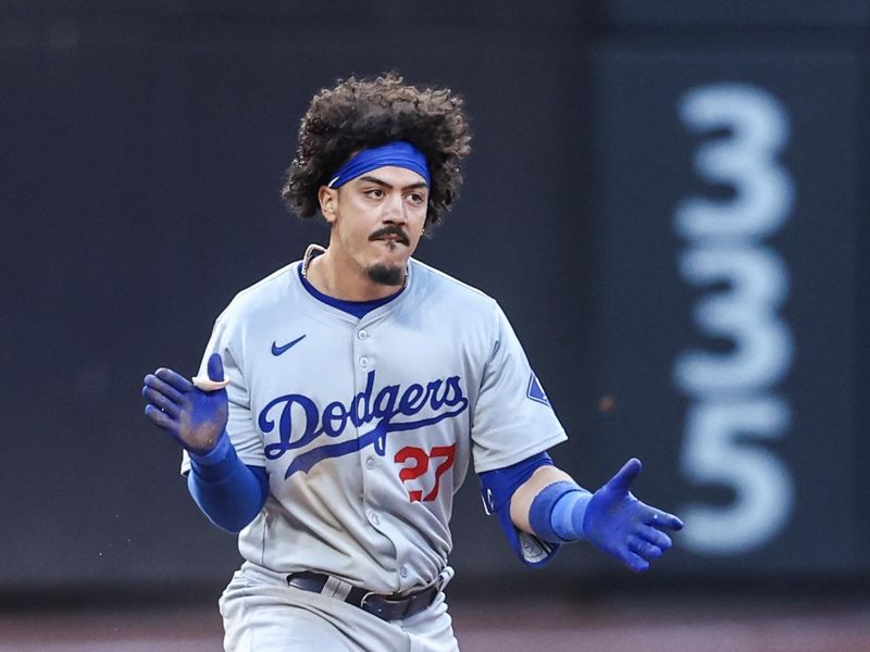 May 29, 2024; New York City, New York, USA;  Los Angeles Dodgers left fielder Miguel Vargas (27) reacts after hitting a two run double in the eighth inning against the New York Mets at Citi Field. Mandatory Credit: Wendell Cruz-USA TODAY Sports