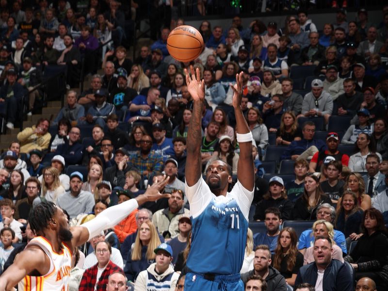 MINNEAPOLIS, MN -  APRIL 12: Naz Reid #11 of the Minnesota Timberwolves shoots the ball during the game against the Atlanta Hawks on April 12, 2024 at Target Center in Minneapolis, Minnesota. NOTE TO USER: User expressly acknowledges and agrees that, by downloading and or using this Photograph, user is consenting to the terms and conditions of the Getty Images License Agreement. Mandatory Copyright Notice: Copyright 2024 NBAE (Photo by David Sherman/NBAE via Getty Images)