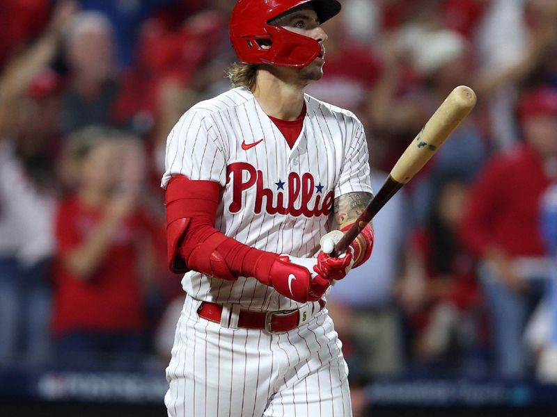 Oct 4, 2023; Philadelphia, Pennsylvania, USA; Philadelphia Phillies second baseman Bryson Stott (5) hits a grand slam against the Miami Marlins during the sixth inning for game two of the Wildcard series for the 2023 MLB playoffs at Citizens Bank Park. Mandatory Credit: Bill Streicher-USA TODAY Sports