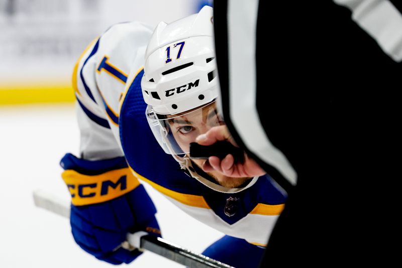 Mar 16, 2024; Detroit, Michigan, USA;  Buffalo Sabres center Tyson Jost (17) gets set for a face off in the first period against the Detroit Red Wings at Little Caesars Arena. Mandatory Credit: Rick Osentoski-USA TODAY Sports