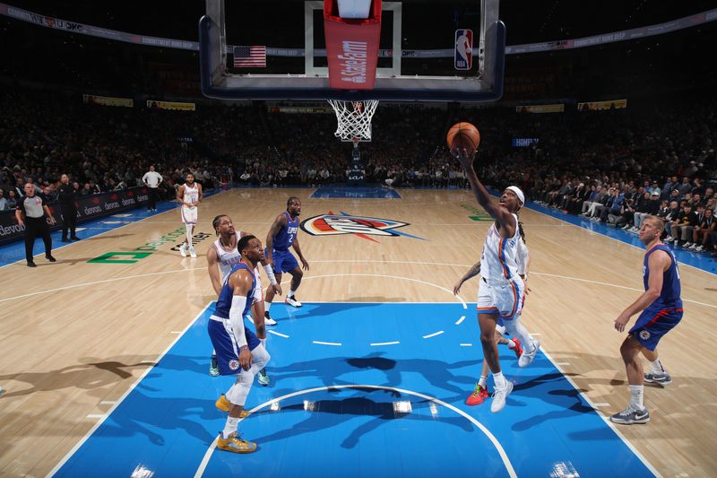 OKLAHOMA CITY, OK - FEBRUARY 22:  Shai Gilgeous-Alexander #2 of the Oklahoma City Thunder drives to the basket during the game against the LA Clippers on February 22SF, 2024 at Paycom Arena in Oklahoma City, Oklahoma. NOTE TO USER: User expressly acknowledges and agrees that, by downloading and or using this photograph, User is consenting to the terms and conditions of the Getty Images License Agreement. Mandatory Copyright Notice: Copyright 2024 NBAE (Photo by Zach Beeker/NBAE via Getty Images)