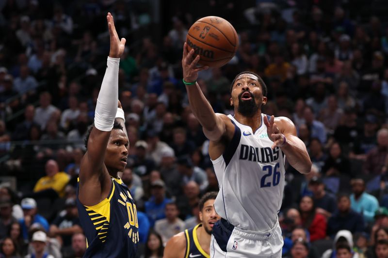 DALLAS, TEXAS - NOVEMBER 04: Spencer Dinwiddie #26 of the Dallas Mavericks makes a move to the basket against Bennedict Mathurin #00 of the Indiana Pacers during the first half at American Airlines Center on November 04, 2024 in Dallas, Texas. NOTE TO USER: User expressly acknowledges and agrees that, by downloading and or using this photograph, User is consenting to the terms and conditions of the Getty Images License Agreement. (Photo by Sam Hodde/Getty Images)