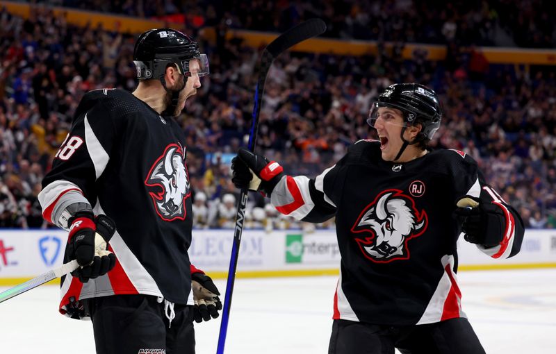 Mar 2, 2024; Buffalo, New York, USA;  Buffalo Sabres left wing Zemgus Girgensons (28) celebrates his goal with center Peyton Krebs (19) during the second period against the Vegas Golden Knights at KeyBank Center. Mandatory Credit: Timothy T. Ludwig-USA TODAY Sports