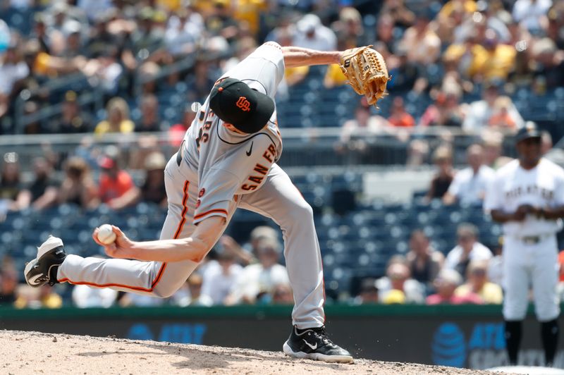 Jul 16, 2023; Pittsburgh, Pennsylvania, USA;  San Francisco Giants relief pitcher Tyler Rogers (71) pitches against the Pittsburgh Pirates during the eighth inning at PNC Park. Mandatory Credit: Charles LeClaire-USA TODAY Sports