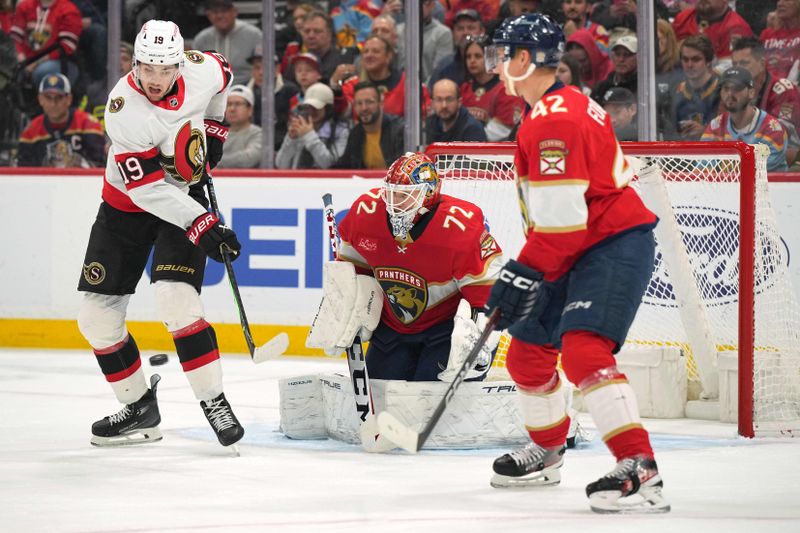 Feb 20, 2024; Sunrise, Florida, USA; Ottawa Senators right wing Drake Batherson (19) redirects the puck as Florida Panthers goaltender Sergei Bobrovsky (72) prepares to make a save in the first period at Amerant Bank Arena. Mandatory Credit: Jim Rassol-USA TODAY Sports