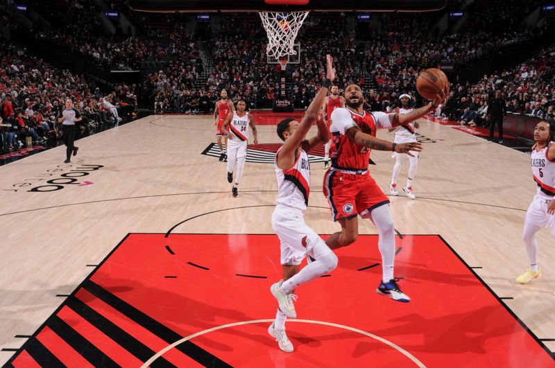 PORTLAND, OR - JANUARY 16: Norman Powell #24 of the LA Clippers shoots the ball during the game against the Portland Trail Blazers on January 16, 2025 at the Moda Center Arena in Portland, Oregon. NOTE TO USER: User expressly acknowledges and agrees that, by downloading and or using this photograph, user is consenting to the terms and conditions of the Getty Images License Agreement. Mandatory Copyright Notice: Copyright 2025 NBAE (Photo by Cameron Browne/NBAE via Getty Images)