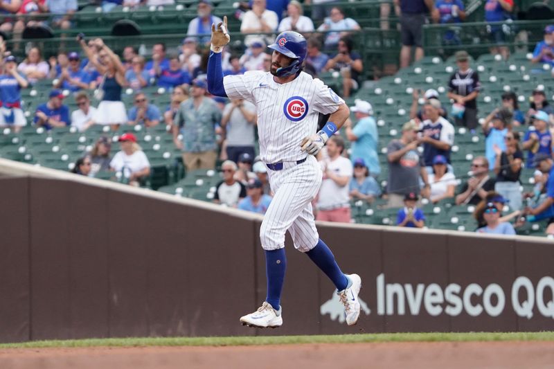 Sep 20, 2024; Chicago, Illinois, USA; Chicago Cubs shortstop Dansby Swanson (7) runs the bases after hitting a home run against the Washington Nationals during the first inning at Wrigley Field. Mandatory Credit: David Banks-Imagn Images