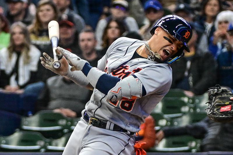 Apr 26, 2023; Milwaukee, Wisconsin, USA; Detroit Tigers shortstop Javier Baez (28) reacts after he was hit by a pitch in the first inning during game against the Milwaukee Brewers at American Family Field. Mandatory Credit: Benny Sieu-USA TODAY Sports