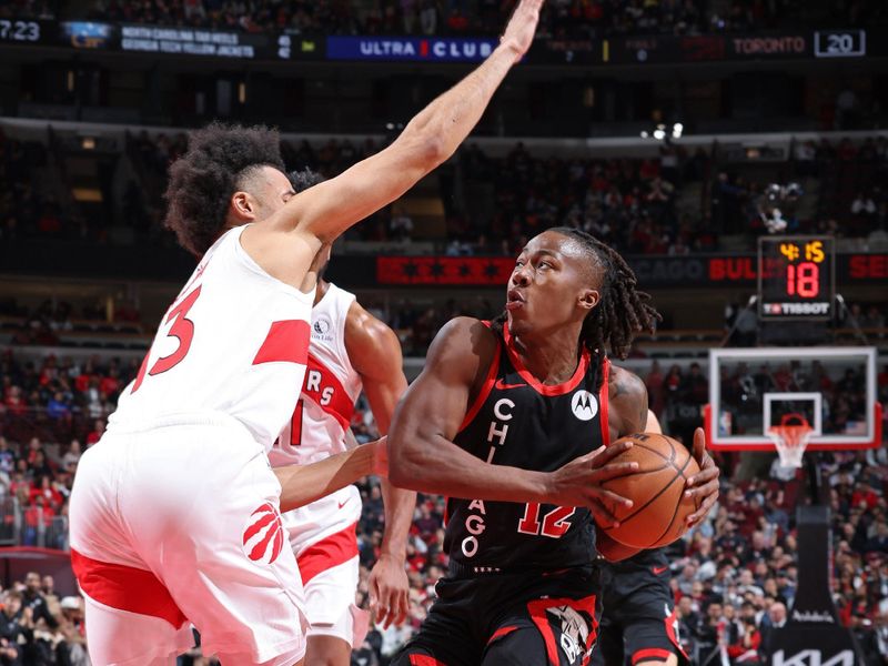 CHICAGO, IL - JANUARY 30: Ayo Dosunmu #12 of the Chicago Bulls handles the ball during the game against the Toronto Raptors on January 30, 2024 at United Center in Chicago, Illinois. NOTE TO USER: User expressly acknowledges and agrees that, by downloading and or using this photograph, User is consenting to the terms and conditions of the Getty Images License Agreement. Mandatory Copyright Notice: Copyright 2024 NBAE (Photo by Jeff Haynes/NBAE via Getty Images)