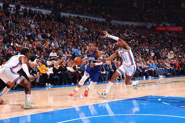 OKLAHOMA CITY, OK - DECEMBER 21: Russell Westbrook #0 of the LA Clippers drives to the basket during the game against the Oklahoma City Thunder on December 21, 2023 at Paycom Arena in Oklahoma City, Oklahoma. NOTE TO USER: User expressly acknowledges and agrees that, by downloading and or using this photograph, User is consenting to the terms and conditions of the Getty Images License Agreement. Mandatory Copyright Notice: Copyright 2023 NBAE (Photo by Zach Beeker/NBAE via Getty Images)