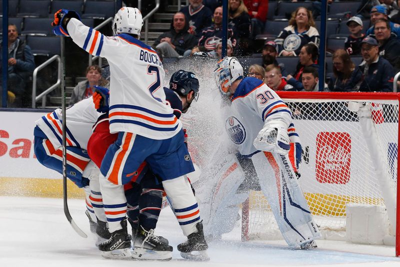 Mar 7, 2024; Columbus, Ohio, USA; Edmonton Oilers goalie Calvin Pickard (30) tracks a rebound after making a save against the Columbus Blue Jackets during the first period at Nationwide Arena. Mandatory Credit: Russell LaBounty-USA TODAY Sports