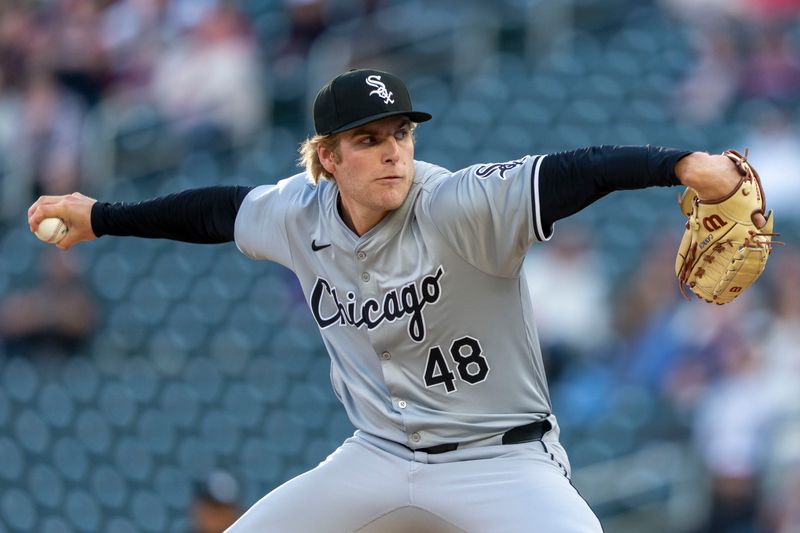 Apr 22, 2024; Minneapolis, Minnesota, USA; Chicago White Sox starting pitcher Jonathan Cannon (48) delivers a pitch against the Minnesota Twins in the first inning at Target Field. Mandatory Credit: Jesse Johnson-USA TODAY Sports