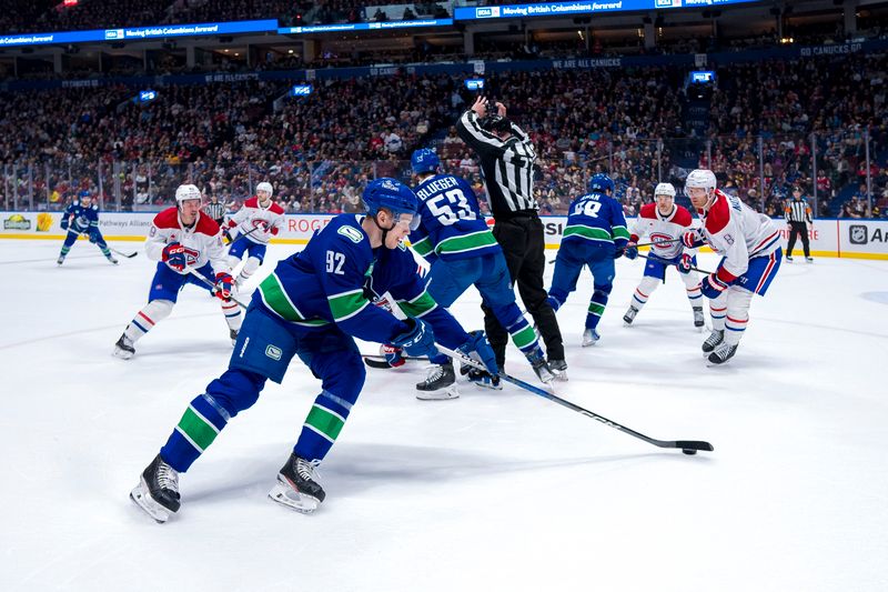 Mar 21, 2024; Vancouver, British Columbia, CAN; Vancouver Canucks forward Vasily Podkolzin (92) handles the puck against the Montreal Canadiens in the first period at Rogers Arena. Mandatory Credit: Bob Frid-USA TODAY Sports