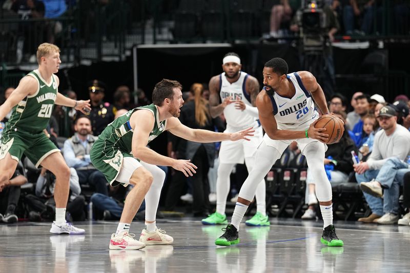 DALLAS, TX - OCTOBER 17: Spencer Dinwiddie #26 of the Dallas Mavericks dribbles the ball during the game against the Milwaukee Bucks during a NBA preseason game on October 17, 2024 at American Airlines Center in Dallas, Texas. NOTE TO USER: User expressly acknowledges and agrees that, by downloading and or using this photograph, User is consenting to the terms and conditions of the Getty Images License Agreement. Mandatory Copyright Notice: Copyright 2024 NBAE (Photo by Glenn James/NBAE via Getty Images)