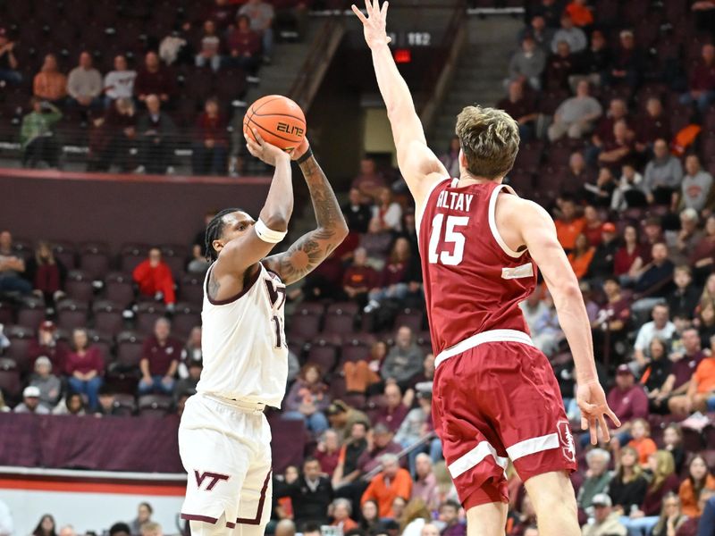 Jan 7, 2026; Blacksburg, Virginia, USA; Virginia Tech Hokies forward Amani Hansberry (13) shoots a shot as Stanford Cardinal forward Oskar Giltay (15) defends during the first half at Cassell Coliseum. Mandatory Credit: Brian Bishop-Imagn Images