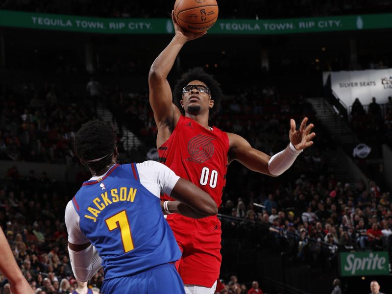 PORTLAND, OR - MARCH 23: Scoot Henderson #00 of the Portland Trail Blazers shoots the ball during the game against the Denver Nuggets on March 23, 2024 at the Moda Center Arena in Portland, Oregon. NOTE TO USER: User expressly acknowledges and agrees that, by downloading and or using this photograph, user is consenting to the terms and conditions of the Getty Images License Agreement. Mandatory Copyright Notice: Copyright 2024 NBAE (Photo by Cameron Browne/NBAE via Getty Images)