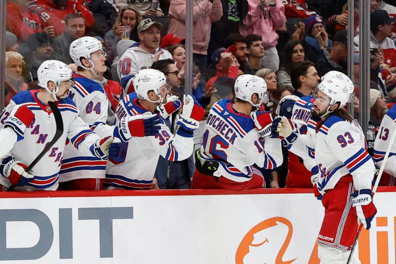 Jan 4, 2025; Washington, District of Columbia, USA; New York Rangers center Mika Zibanejad (93) celebrates after scoring a goal against the Washington Capitals in the third period at Capital One Arena. Mandatory Credit: Geoff Burke-Imagn Images