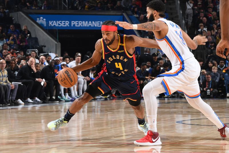 SAN FRANCISCO, CA - NOVEMBER 27: Moses Moody #4 of the Golden State Warriors dribbles the ball during the game against the Oklahoma City Thunder on November 27, 2024 at Chase Center in San Francisco, California. NOTE TO USER: User expressly acknowledges and agrees that, by downloading and or using this photograph, user is consenting to the terms and conditions of Getty Images License Agreement. Mandatory Copyright Notice: Copyright 2024 NBAE (Photo by Noah Graham/NBAE via Getty Images)