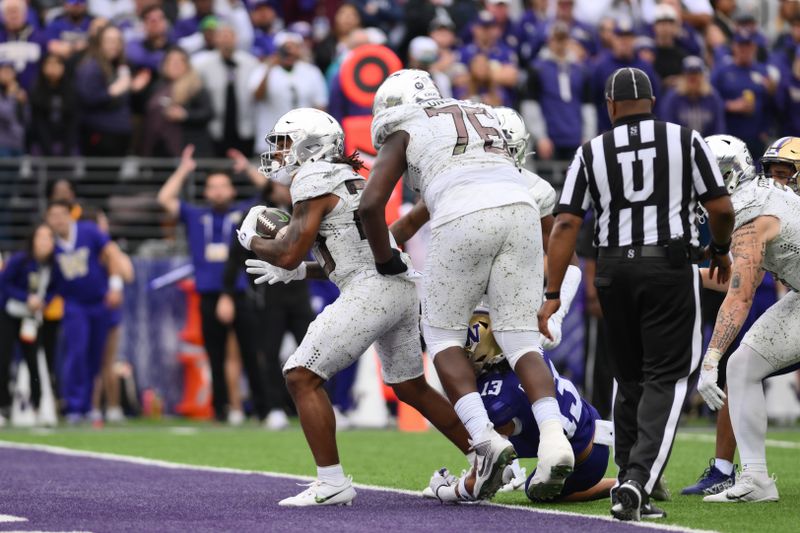 Oct 14, 2023; Seattle, Washington, USA; Oregon Ducks wide receiver Gary Bryant Jr. (2) scores a touchdown against the Washington Huskies during the second half at Alaska Airlines Field at Husky Stadium. Mandatory Credit: Steven Bisig-USA TODAY Sports