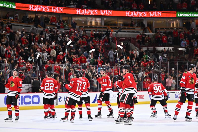 Dec 7, 2023; Chicago, Illinois, USA; The Chicago Blackhawks salute their fans after defeating the Anaheim Ducks 1-0 at United Center. Mandatory Credit: Jamie Sabau-USA TODAY Sports