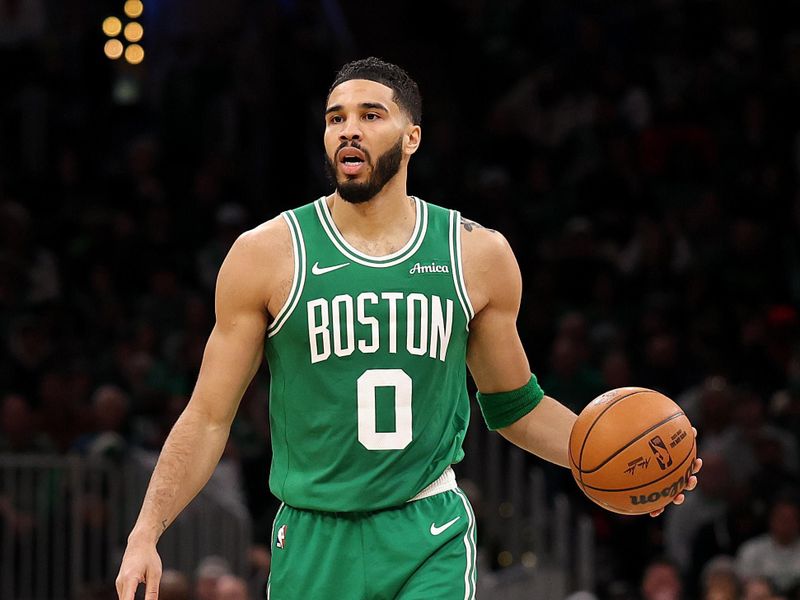 BOSTON, MASSACHUSETTS - FEBRUARY 23: Jayson Tatum #0 of the Boston Celtics dribbles downcourt against the New York Knicks during the second half at TD Garden on February 23, 2025 in Boston, Massachusetts.  The Celtics defeat the Knicks 118-105. NOTE TO USER: User expressly acknowledges and agrees that, by downloading and or using this photograph, User is consenting to the terms and conditions of the Getty Images License Agreement.  (Photo by Maddie Meyer/Getty Images)