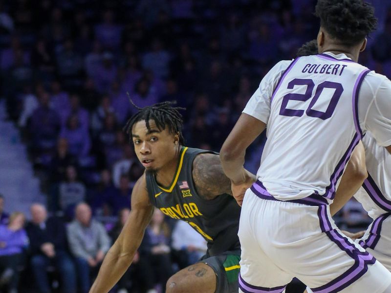 Jan 16, 2024; Manhattan, Kansas, USA; Baylor Bears guard Langston Love (13) dribbles around Kansas State Wildcats forward Jerrell Colbert (20) during the second half at Bramlage Coliseum. Mandatory Credit: Scott Sewell-USA TODAY Sports