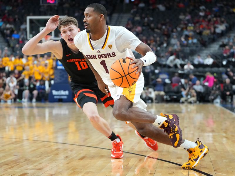 Mar 8, 2023; Las Vegas, NV, USA; Arizona State Sun Devils guard Luther Muhammad (1) dribbles against Oregon State Beavers forward Tyler Bilodeau (10) during the first half at T-Mobile Arena. Mandatory Credit: Stephen R. Sylvanie-USA TODAY Sports