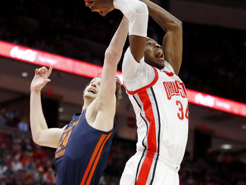 Feb 26, 2023; Columbus, Ohio, USA;  Ohio State Buckeyes center Felix Okpara (34) has his shot blocked by Illinois Fighting Illini forward Matthew Mayer (24) during the second half at Value City Arena. Mandatory Credit: Joseph Maiorana-USA TODAY Sports