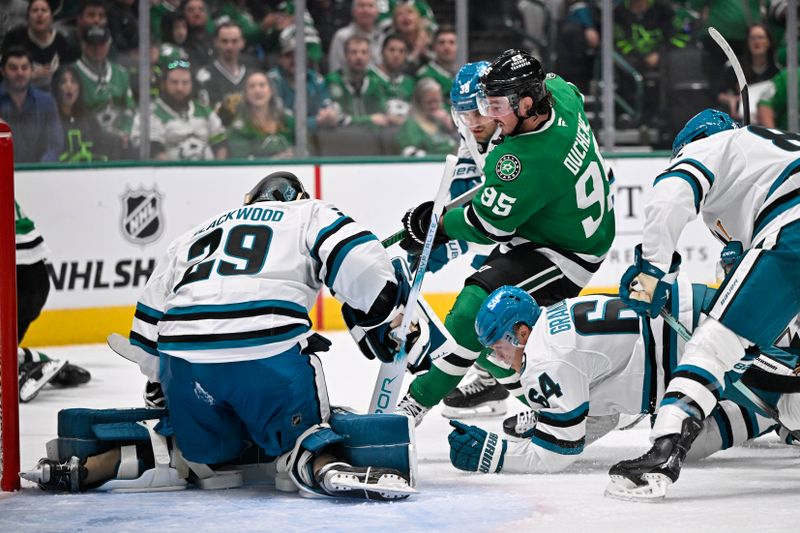 Oct 15, 2024; Dallas, Texas, USA; Dallas Stars center Matt Duchene (95) attempts to poke the puck past San Jose Sharks goaltender Mackenzie Blackwood (29) during the second period at the American Airlines Center. Mandatory Credit: Jerome Miron-Imagn Images