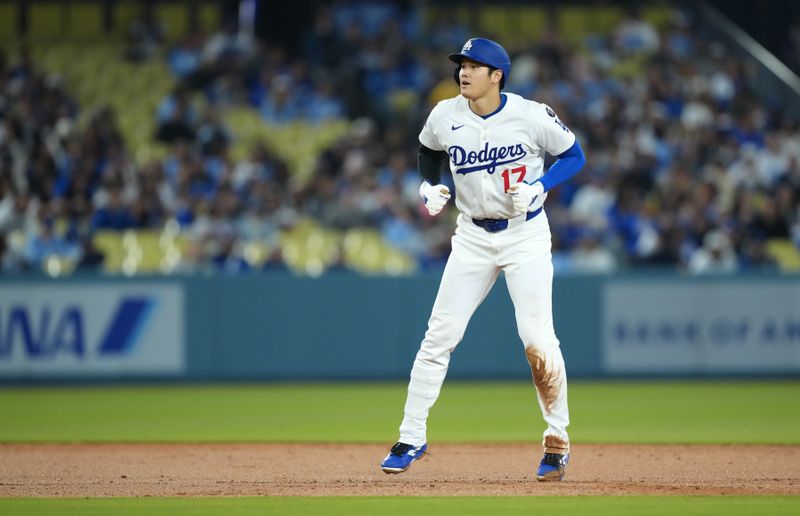 Apr 29, 2025; Los Angeles, California, USA; Los Angeles Dodgers designated hitter Shohei Ohtani (17) leads off second during the second inning against the Miami Marlins at Dodger Stadium. Mandatory Credit: Kirby Lee-Imagn Images
