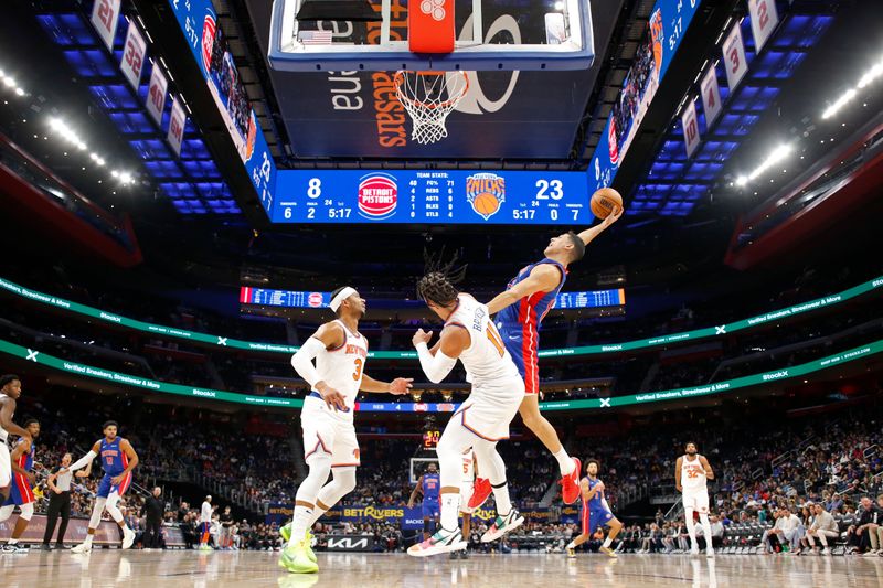 DETROIT, MI - NOVEMBER 1: Simone Fontecchio #19 of the Detroit Pistons rebounds the ball during the game against the New York Knicks on November 1, 2024 at Little Caesars Arena in Detroit, Michigan. NOTE TO USER: User expressly acknowledges and agrees that, by downloading and/or using this photograph, User is consenting to the terms and conditions of the Getty Images License Agreement. Mandatory Copyright Notice: Copyright 2024 NBAE (Photo by Brian Sevald/NBAE via Getty Images)