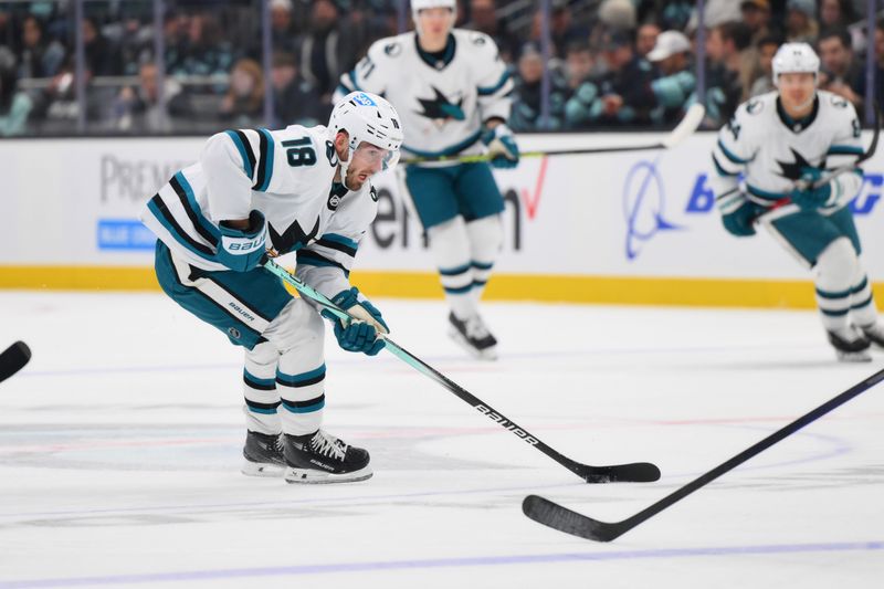 Nov 22, 2023; Seattle, Washington, USA; San Jose Sharks right wing Filip Zadina (18) advances the puck against the Seattle Kraken during the first period at Climate Pledge Arena. Mandatory Credit: Steven Bisig-USA TODAY Sports