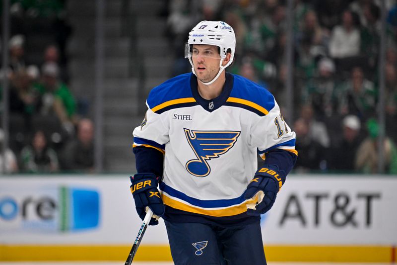 Dec 14, 2024; Dallas, Texas, USA; St. Louis Blues defenseman Cam Fowler (17) skates against the Dallas Stars during the first period at American Airlines Center. Mandatory Credit: Jerome Miron-Imagn Images