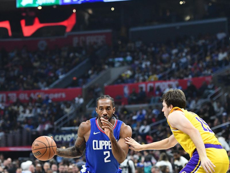 LOS ANGELES, CA - JANUARY 23:  Kawhi Leonard #2 of the LA Clippers goes to the basket during the game on January 23, 2024 at Crypto.Com Arena in Los Angeles, California. NOTE TO USER: User expressly acknowledges and agrees that, by downloading and/or using this Photograph, user is consenting to the terms and conditions of the Getty Images License Agreement. Mandatory Copyright Notice: Copyright 2024 NBAE (Photo by Juan Ocampo/NBAE via Getty Images)