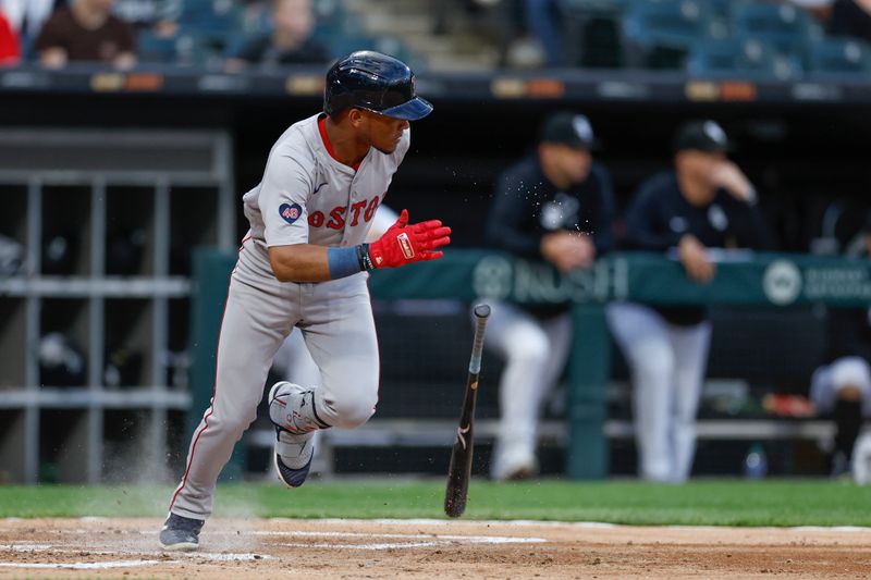 Jun 6, 2024; Chicago, Illinois, USA; Boston Red Sox outfielder Ceddanne Rafaela (43) watches his two-run single against the Chicago White Sox during the second inning at Guaranteed Rate Field. Mandatory Credit: Kamil Krzaczynski-USA TODAY Sports