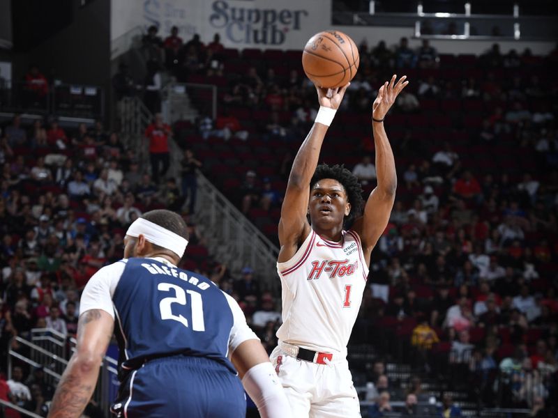 HOUSTON, TX - MARCH 31: Amen Thompson #1 of the Houston Rockets shoots the ball during the game against the Dallas Mavericks on March 31, 2024 at the Toyota Center in Houston, Texas. NOTE TO USER: User expressly acknowledges and agrees that, by downloading and or using this photograph, User is consenting to the terms and conditions of the Getty Images License Agreement. Mandatory Copyright Notice: Copyright 2024 NBAE (Photo by Logan Riely/NBAE via Getty Images)